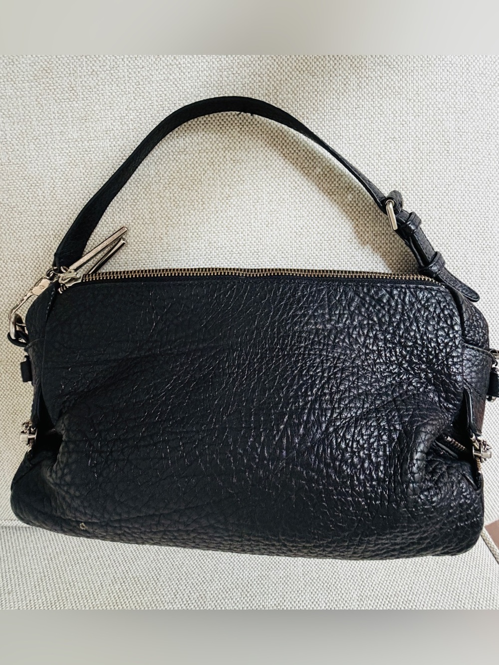 3.1 Phillip Lim Black Pebbled Leather Shouder Hand Nag with 19 inch strap.